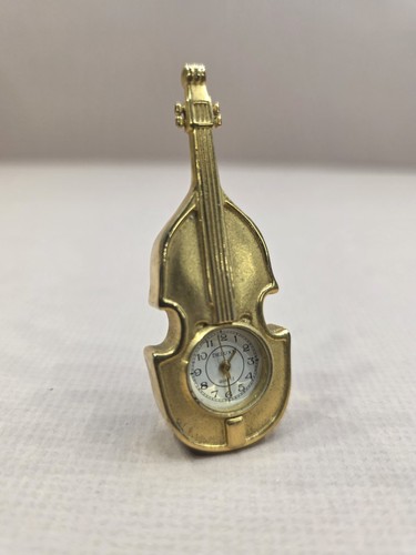 Vintage quartz violin brass - quartz,